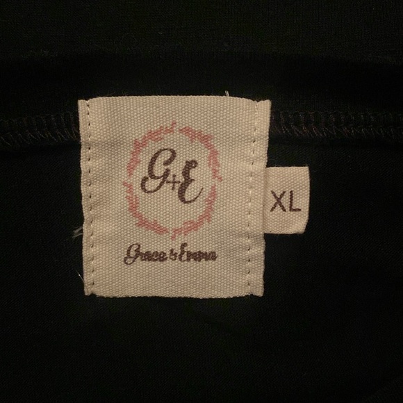 Bundle of 3 boutique brand tops plus one mystery item. - Picture 10 of 10